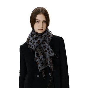Winter chunky leopard print knit scarf for women with elegant tassel details