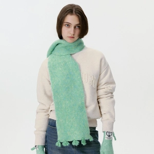 Mint green mohair blend scarf with tassel details and matching knit gloves for winter