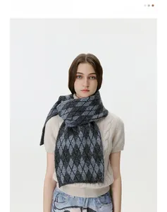 Detail of grey diamond lattice jacquard scarf showing the premium knit texture and pattern