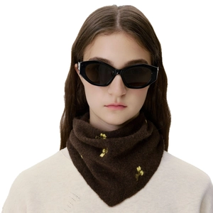 Brown knitted wool headscarf with yellow floral embroidery and soft texture on model