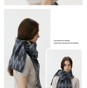 Close-up of grey diamond lattice knit scarf showing warm thick texture and styling