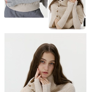 Detailed close-up of beige ribbed knit sleeve covers with decorative brown buttons