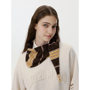 Striped knit scarf with colorful lines over beige sweatshirt featuring MOROMORRO embroidery
