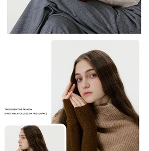 Detail of high neck knitted sweater showing soft fabric texture and autumn fashion style