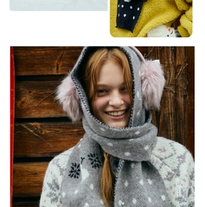 Winter set with gray snowflake knit scarf and pink plush earmuffs on model