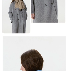 Detailed view of grey wool coat texture and tan fringed scarf with classic buttons