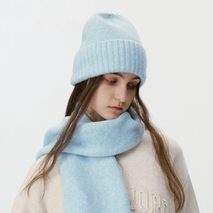 Winter light blue knitted beanie hat and scarf set with soft ribbed mohair texture