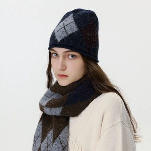 Knitted argyle pattern beanie and scarf set for winter in deep blue and brown tones