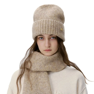 Winter oatmeal ribbed knit beanie and scarf set featuring a circular metal logo