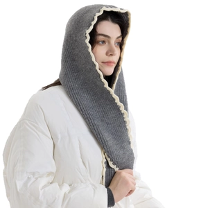 Gray knitted balaclava hood with white wave trim for winter warmth and protection