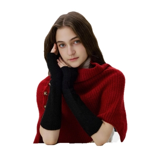 Winter set with long black fingerless knit gloves and a red shawl with buttons