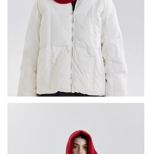 Detailed view of winter puffer jacket with metal zipper and red knitted balaclava hood