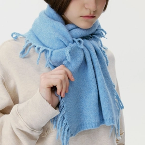 Solid light blue wool blend knit scarf with fringe tassel detail for autumn and winter