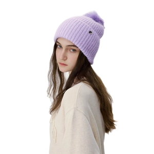 Stylish purple knit beanie with large fur pom pom and rib-knit texture for winter warmth