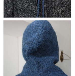 Detail of grey herringbone knit fabric and dark blue plush fleece hood with drawstrings