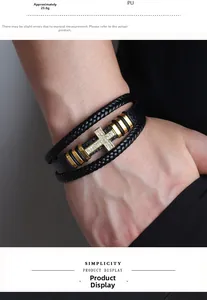 Detail of multi-layer PU leather bracelet with gold-plated zircon cross on male wrist