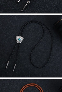 Detail of western bolo tie featuring heart turquoise slider and engraved metal tips