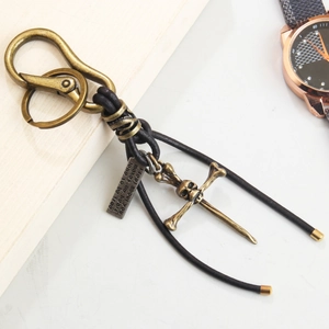 Porte-clés vintage en cuir avec pendentif queue de sirène et crâne en métal bronze