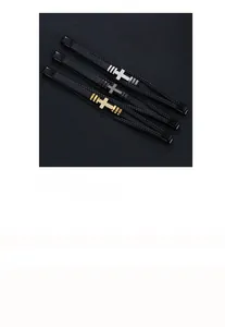 Three-piece braided leather bracelets featuring zircon-encrusted metal cross charms