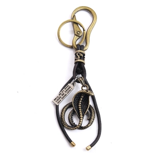 Retro cobra pendant keychain with vintage brass carabiner and engraved leather cord