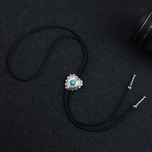 Vintage punk heart turquoise bolo tie with braided black leather cord and silver buckle