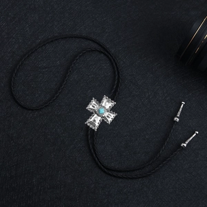 Cravate Bolo cowboy avec croix en argent vintage et turquoise bleue sur corde tressée noire