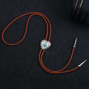 Vintage heart turquoise bolo tie with brown braided leather cord and silver accents