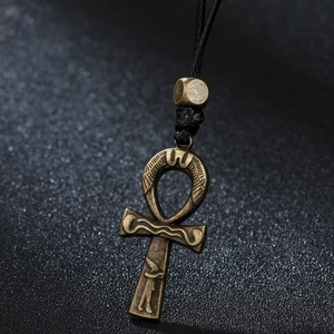 Vintage Egyptian Ankh cross pendant necklace with engraved symbols and black woven cord