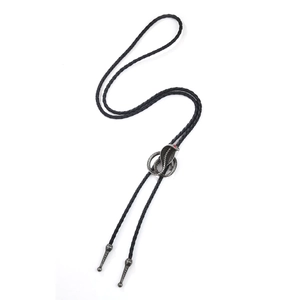 Vintage cobra bolo tie with black braided leather cord and silver snake pendant