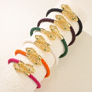 Bracelets tressés tête de serpent en plusieurs couleurs avec métal doré et pierres vertes