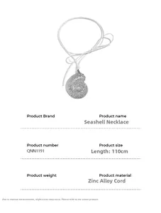 Detail showing conch pendant with spiral texture and white adjustable cord necklace