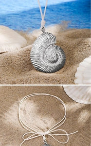 Detail of nautical nautilus shell pendant necklace with adjustable white woven cord rope