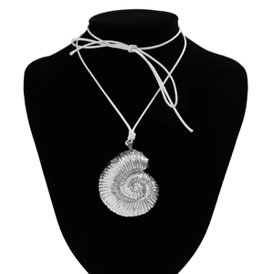Bohemian silver nautilus shell pendant necklace on white cord with black model display