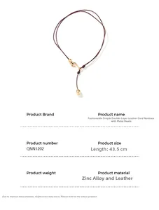 Detail of minimalist leather cord necklace with a polished gold zinc alloy bead charm
