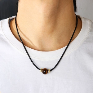 Collier tressé noir pour homme avec pierre œil de tigre naturelle et perles dorées polies
