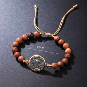 Saint Benedict wooden bead bracelet with adjustable cord and detailed metal medal