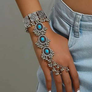 Bohemian retro silver hand chain with turquoise stones and dangling bead details
