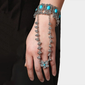 Bohemian silver slave bracelet with turquoise stones and floral ring attachment