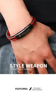 Close-up of red and black woven leather bracelet with cross and Joshua 1:9 engraving