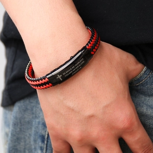 Men's WWJD woven bracelet with Joshua 1:9 engraved black stainless steel clasp worn on wrist