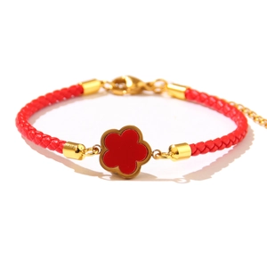 Red braided cord bracelet with 18k gold-plated clover pendant and adjustable clasp