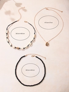 Bohemian multilayer necklace set with shell pendants and black beads, lengths 38.5-57cm