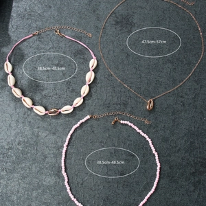 Three-layer bohemian beaded necklace set with natural shell pendants and adjustable chains