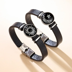 Matching sun and moon woven leather bracelets for couples with stainless steel charms