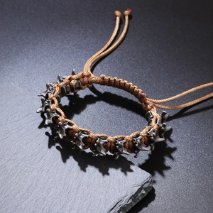 Adjustable brown braided punk bracelet with silver-tone metal dragon bone elements