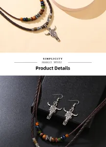 Detail of bohemian necklace and earrings set featuring retro silver bull head pendants