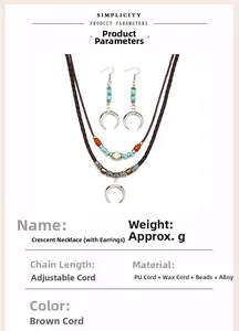 Detail of vintage bohemian crescent moon necklace with turquoise beads and leather cord