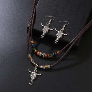 Vintage western cow head pendant necklace with wooden beads and woven rope chain