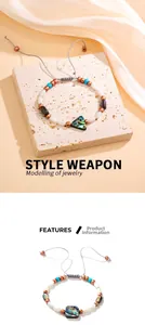 Détail du bracelet bohème fait main en nacre d'abalone avec cordon gris ajustable
