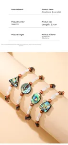 Détail d'un bracelet de 33cm en perles d'abalone naturelle avec accents en bronze